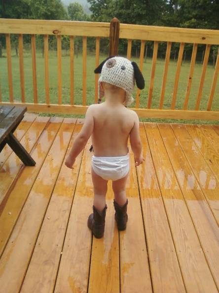 The other day, Ezra insisted on wearing his dog toboggan backward, with his boots and undies in the rain. He claimed the hat would keep his head from getting wet. Smart kid, eh?